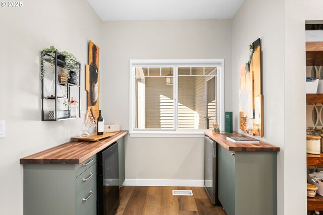 9619 NW Silver Ridge Loop, Portland, OR 97229 - office with beverage cooler, dark wood-type flooring, and baseboards
