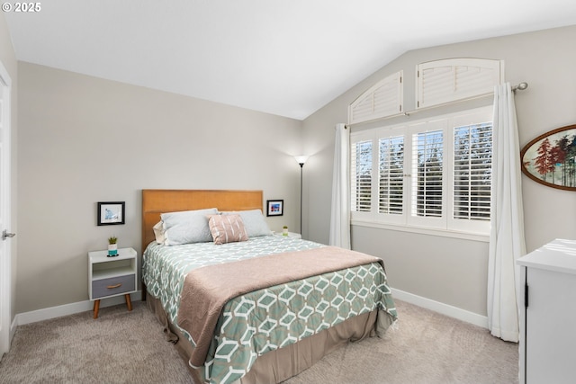9619 NW Silver Ridge Loop, Portland, OR 97229 - bedroom with light colored carpet, vaulted ceiling, and baseboards