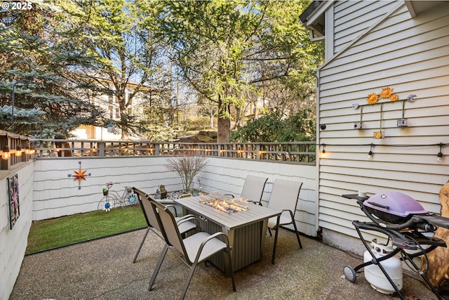 9619 NW Silver Ridge Loop, Portland, OR 97229 - view of patio featuring grilling area and an outdoor fire pit