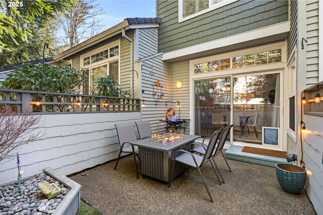 9619 NW Silver Ridge Loop, Portland, OR 97229 - view of patio with a fire pit