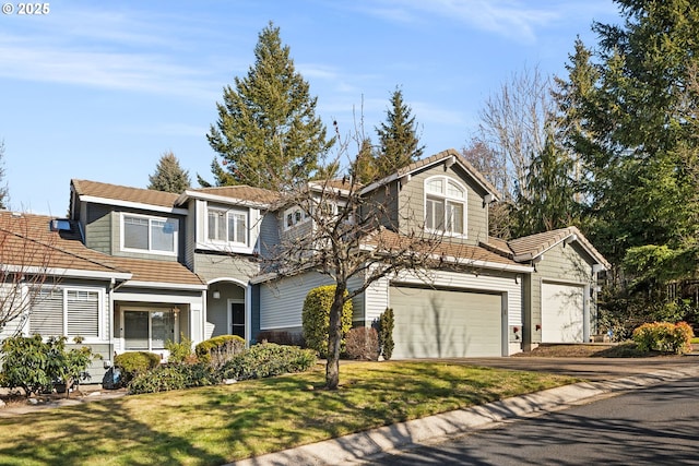 9619 NW Silver Ridge Loop, Portland, OR 97229 - traditional home with an attached garage, driveway, and a front lawn