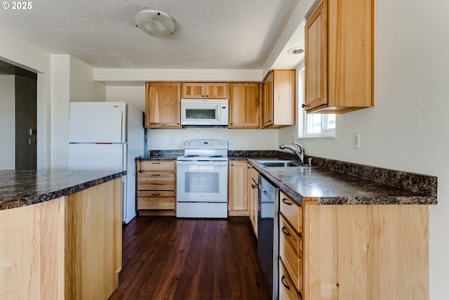 786788 W Quinalt St, Springfield, OR 97477 - kitchen with white appliances, dark countertops, and dark wood finished floors