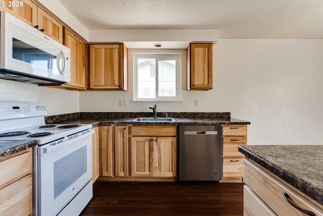 786788 W Quinalt St, Springfield, OR 97477 - kitchen featuring white appliances, dark countertops, and dark wood-type flooring