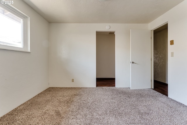786788 W Quinalt St, Springfield, OR 97477 - unfurnished room with dark colored carpet