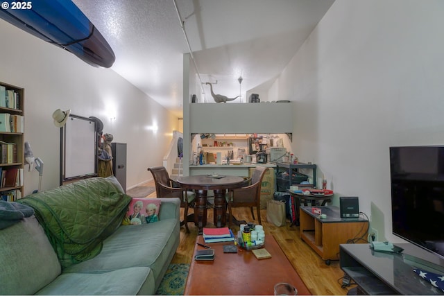 1910 SW 18th Ave Unit 23, Portland, OR 97201 - living area with wood finished floors and stairway