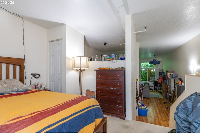 1910 SW 18th Ave Unit 23, Portland, OR 97201 - bedroom featuring a textured ceiling