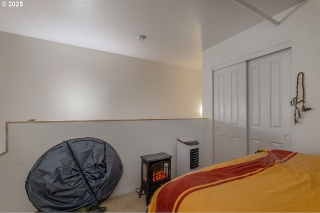 1910 SW 18th Ave Unit 23, Portland, OR 97201 - bedroom featuring light carpet and a closet