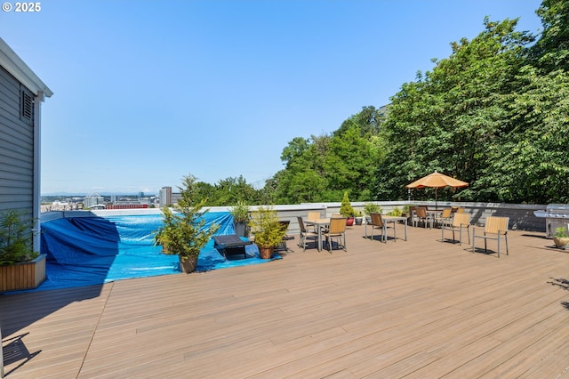 1910 SW 18th Ave Unit 23, Portland, OR 97201 - wooden terrace with outdoor dining area and grilling area