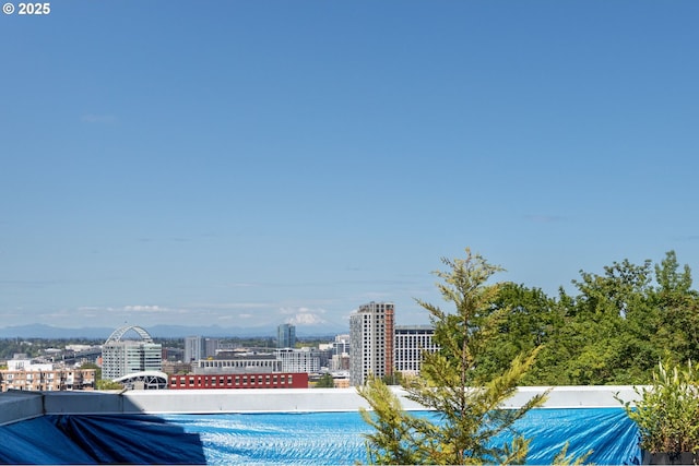 1910 SW 18th Ave Unit 23, Portland, OR 97201 - view of swimming pool featuring a city view