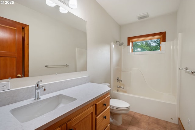 full bath with toilet, tile patterned flooring, tub / shower combination, and vanity