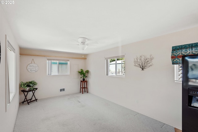 6 Creek Ln, Lakeside, OR 97449 - carpeted empty room with ceiling fan
