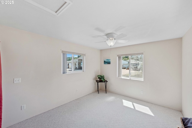 6 Creek Ln, Lakeside, OR 97449 - empty room with healthy amount of natural light, attic access, carpet, and ceiling fan