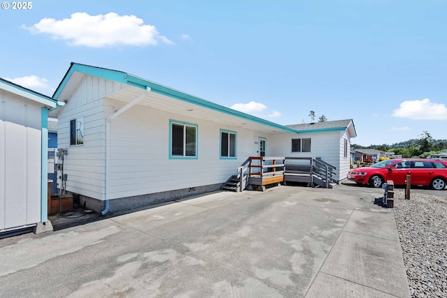 6 Creek Ln, Lakeside, OR 97449 - back of house with a wooden deck