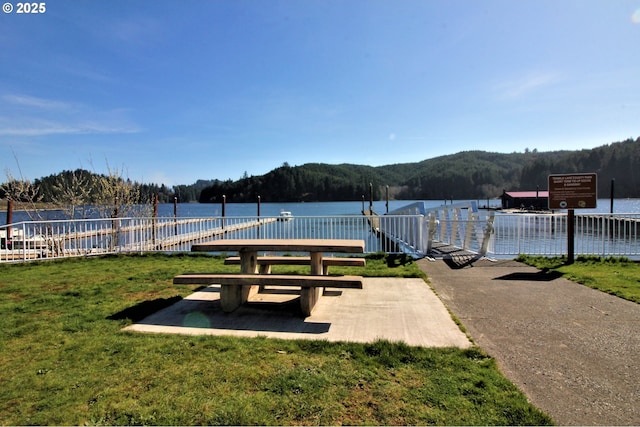 6 Creek Ln, Lakeside, OR 97449 - view of home's community with a lawn, a water and mountain view, and a wooded view