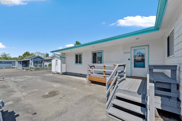 6 Creek Ln, Lakeside, OR 97449 - doorway to property featuring a wooden deck and crawl space