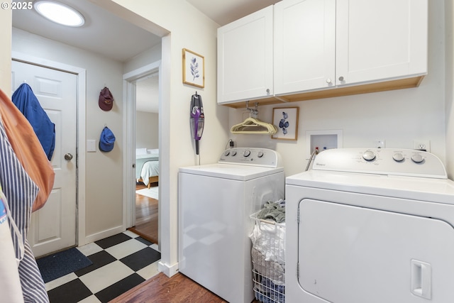 2325 Laurel Ave, Salem, OR 97301 - laundry room featuring light flooring, cabinet space, and washing machine and dryer