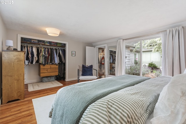 2325 Laurel Ave, Salem, OR 97301 - bedroom featuring a closet, wood finished floors, and baseboards
