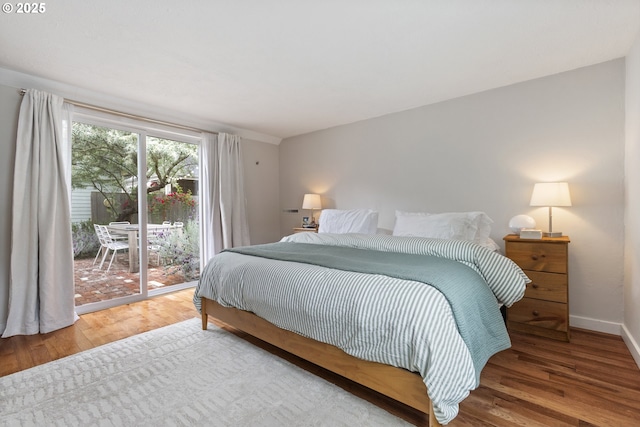 2325 Laurel Ave, Salem, OR 97301 - bedroom with access to exterior, wood finished floors, and baseboards