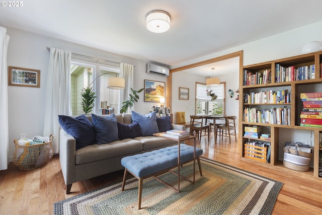 2325 Laurel Ave, Salem, OR 97301 - living room with an AC wall unit and wood finished floors
