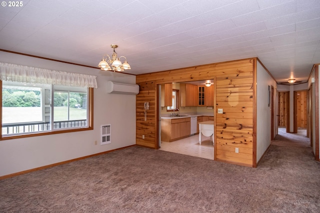 3333 Bullock Rd, Oakland, OR 97462 - unfurnished living room with a wall unit AC, light colored carpet, heating unit, a chandelier, and wood walls
