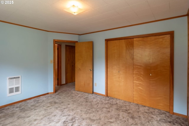 3333 Bullock Rd, Oakland, OR 97462 - unfurnished bedroom featuring crown molding, carpet flooring, and a closet