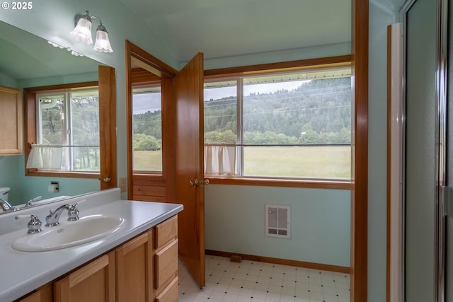 3333 Bullock Rd, Oakland, OR 97462 - bathroom with tile patterned floors, vanity, and vaulted ceiling