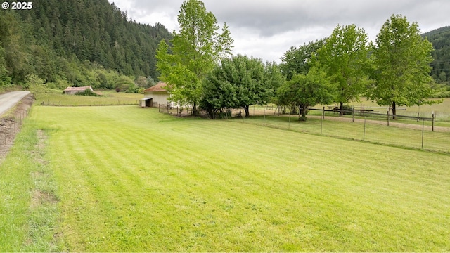 3333 Bullock Rd, Oakland, OR 97462 - view of yard featuring a wooded view and a rural view