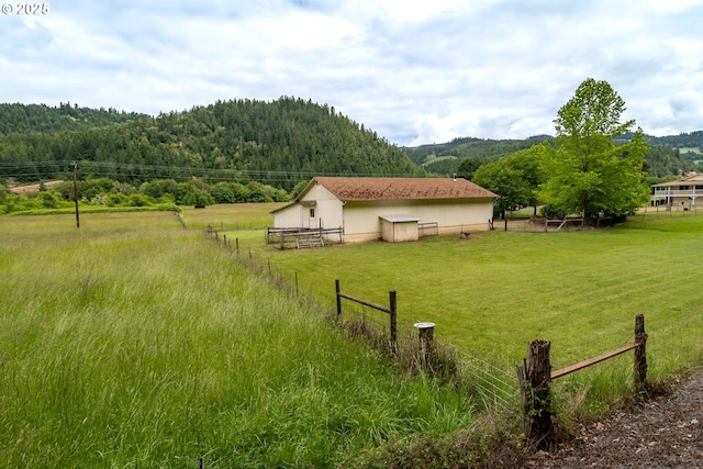 3333 Bullock Rd, Oakland, OR 97462 - view of yard with a rural view, a wooded view, a mountain view, and an outbuilding