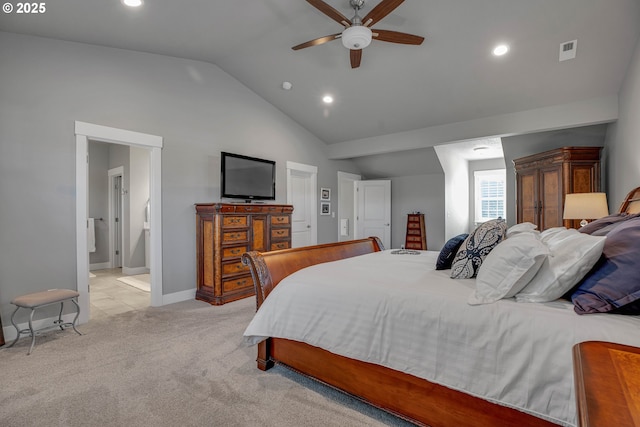 carpeted bedroom with lofted ceiling, connected bathroom, and ceiling fan