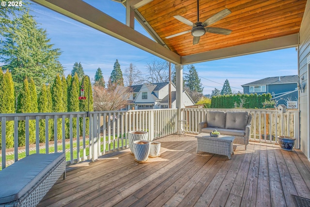 deck featuring an outdoor hangout area and ceiling fan