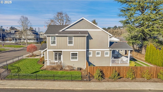 exterior space featuring cooling unit and a yard