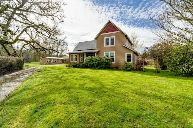 view of front of home with a front lawn