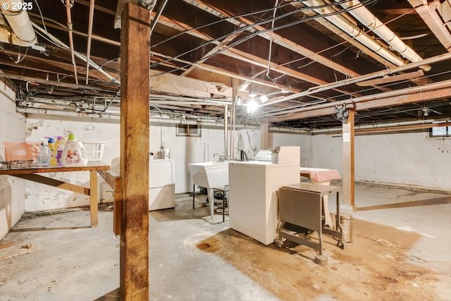 4435 SE Belmont St, Portland, OR 97215 - unfinished below grade area with washing machine and clothes dryer and a sink