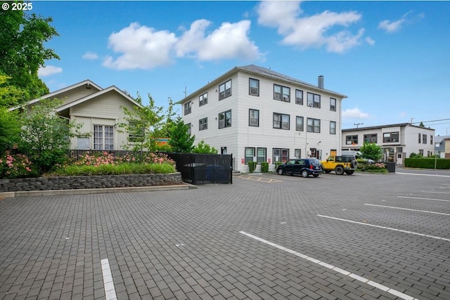 4435 SE Belmont St, Portland, OR 97215 - view of building exterior featuring uncovered parking
