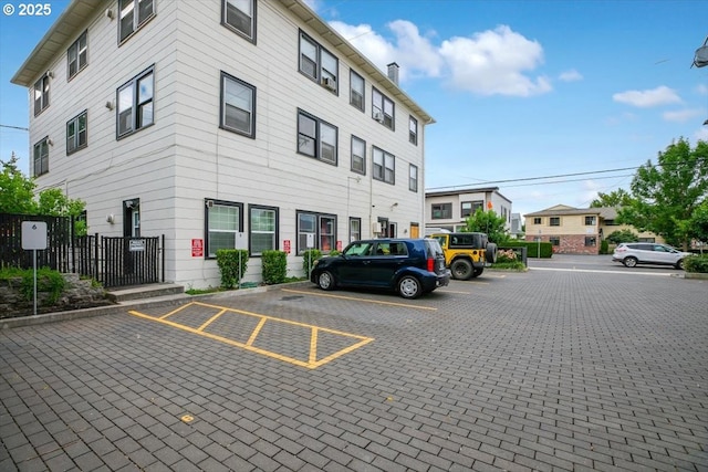 4435 SE Belmont St, Portland, OR 97215 - view of building exterior featuring uncovered parking