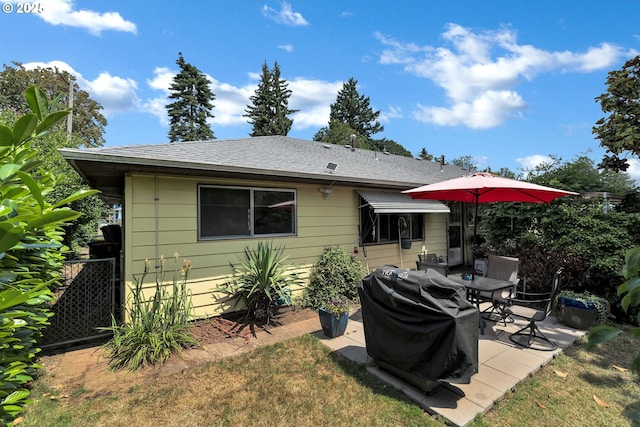 17222 SW Blanton St, Beaverton, OR 97078 - back of house with a patio area, a shingled roof, and outdoor dining space