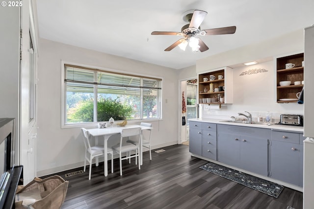 17222 SW Blanton St, Beaverton, OR 97078 - kitchen featuring open shelves, gray cabinets, ceiling fan, dark wood-type flooring, and light countertops