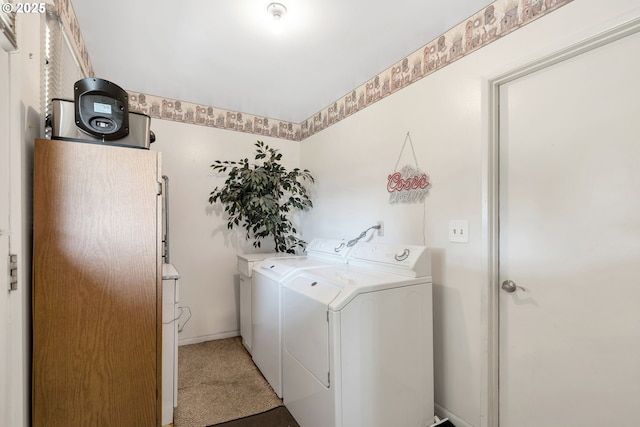 17222 SW Blanton St, Beaverton, OR 97078 - laundry area with washer and clothes dryer and light carpet