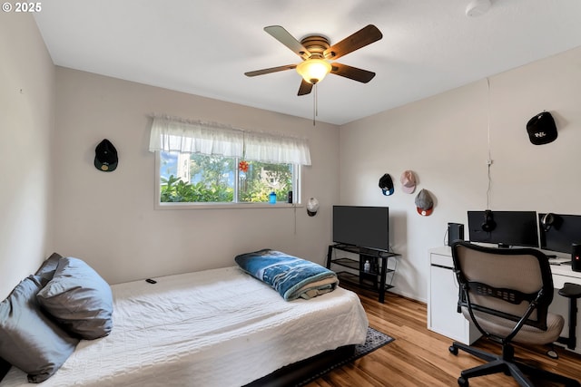 17222 SW Blanton St, Beaverton, OR 97078 - bedroom with wood finished floors, a desk, and ceiling fan