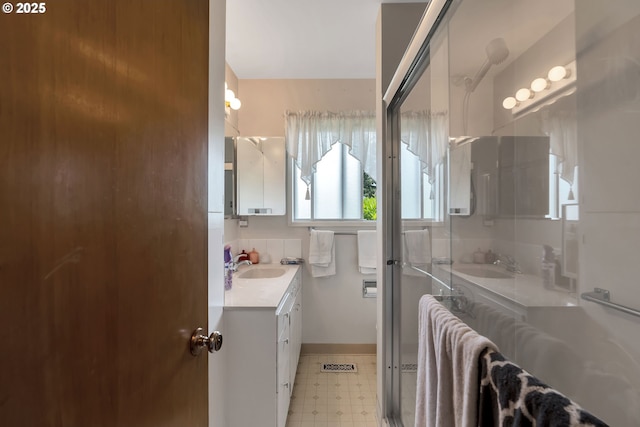 17222 SW Blanton St, Beaverton, OR 97078 - bathroom with tile patterned floors, vanity, and a shower stall
