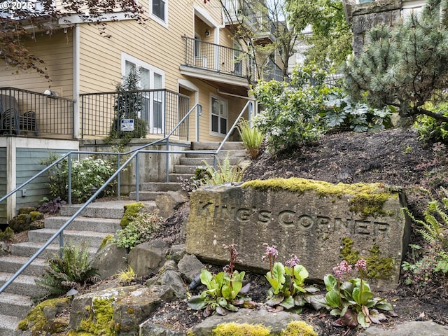 view of community featuring stairway