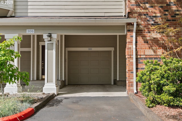 garage with driveway