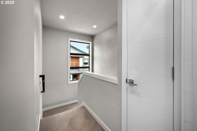 5942 NE 42nd Ave, Portland, OR 97218 - corridor with carpet, recessed lighting, a textured ceiling, and an upstairs landing