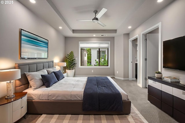 5942 NE 42nd Ave, Portland, OR 97218 - bedroom with light carpet, recessed lighting, a tray ceiling, and a ceiling fan