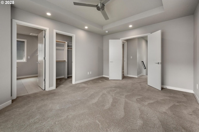 5942 NE 42nd Ave, Portland, OR 97218 - unfurnished bedroom with carpet, recessed lighting, a walk in closet, a raised ceiling, and ensuite bathroom