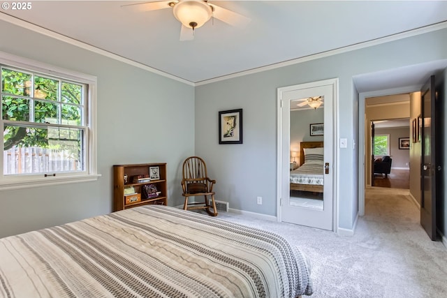 3900 SW Dolph Ct, Portland, OR 97219 - bedroom featuring light carpet, ornamental molding, baseboards, and a ceiling fan