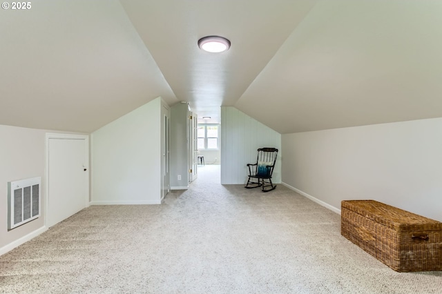 3900 SW Dolph Ct, Portland, OR 97219 - additional living space with carpet, vaulted ceiling, and baseboards