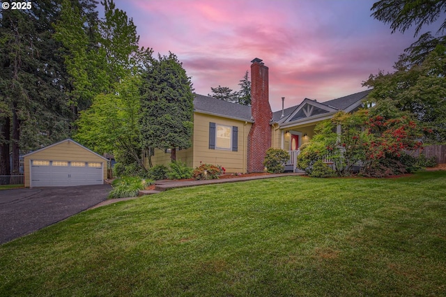 3900 SW Dolph Ct, Portland, OR 97219 - view of front of property featuring a detached garage, an outdoor structure, a front yard, and a chimney