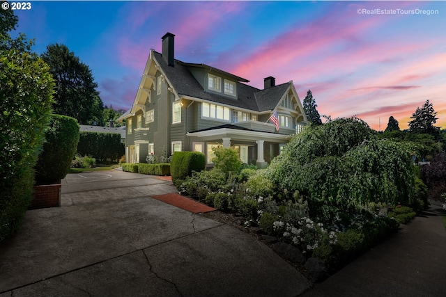 view of property exterior at dusk