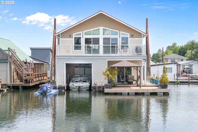 18989 NE Marine Dr Unit 44, Portland, OR 97230 - rear view of property with a balcony and a water view
